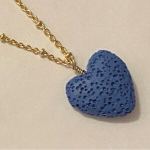 New AVON Essential Oil Lava Heart in original box